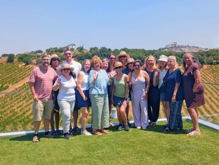 Travelers enjoying an international Vineyard Voyages wine journey