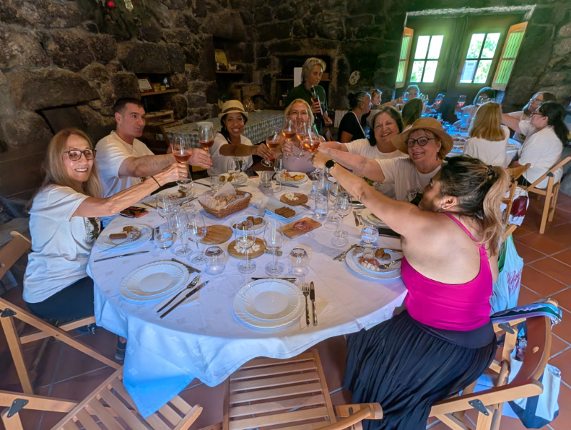 Guests sharing a long-table lunch at a Vinho Verde estate