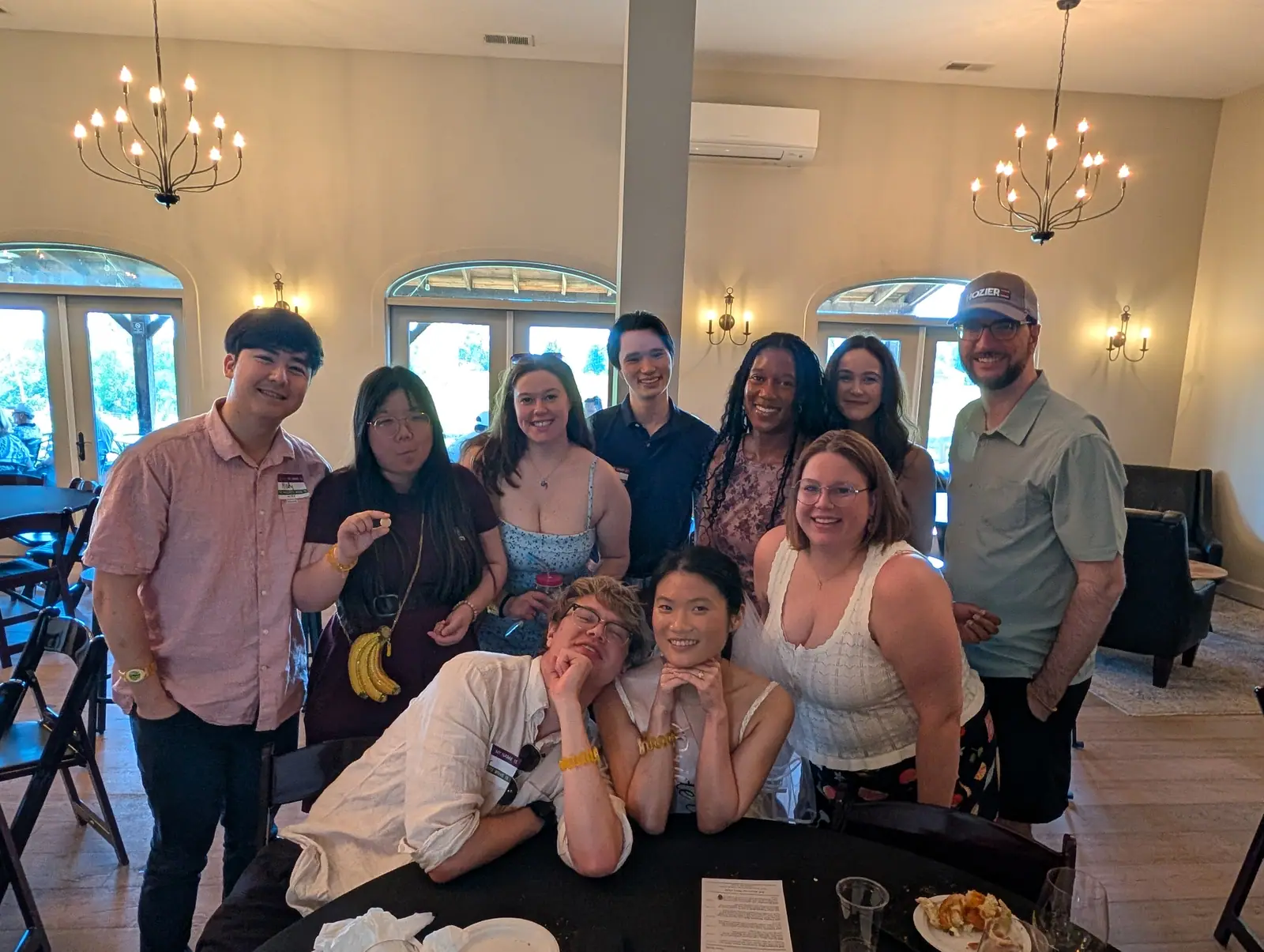 A team laughing together at the end of a tasting