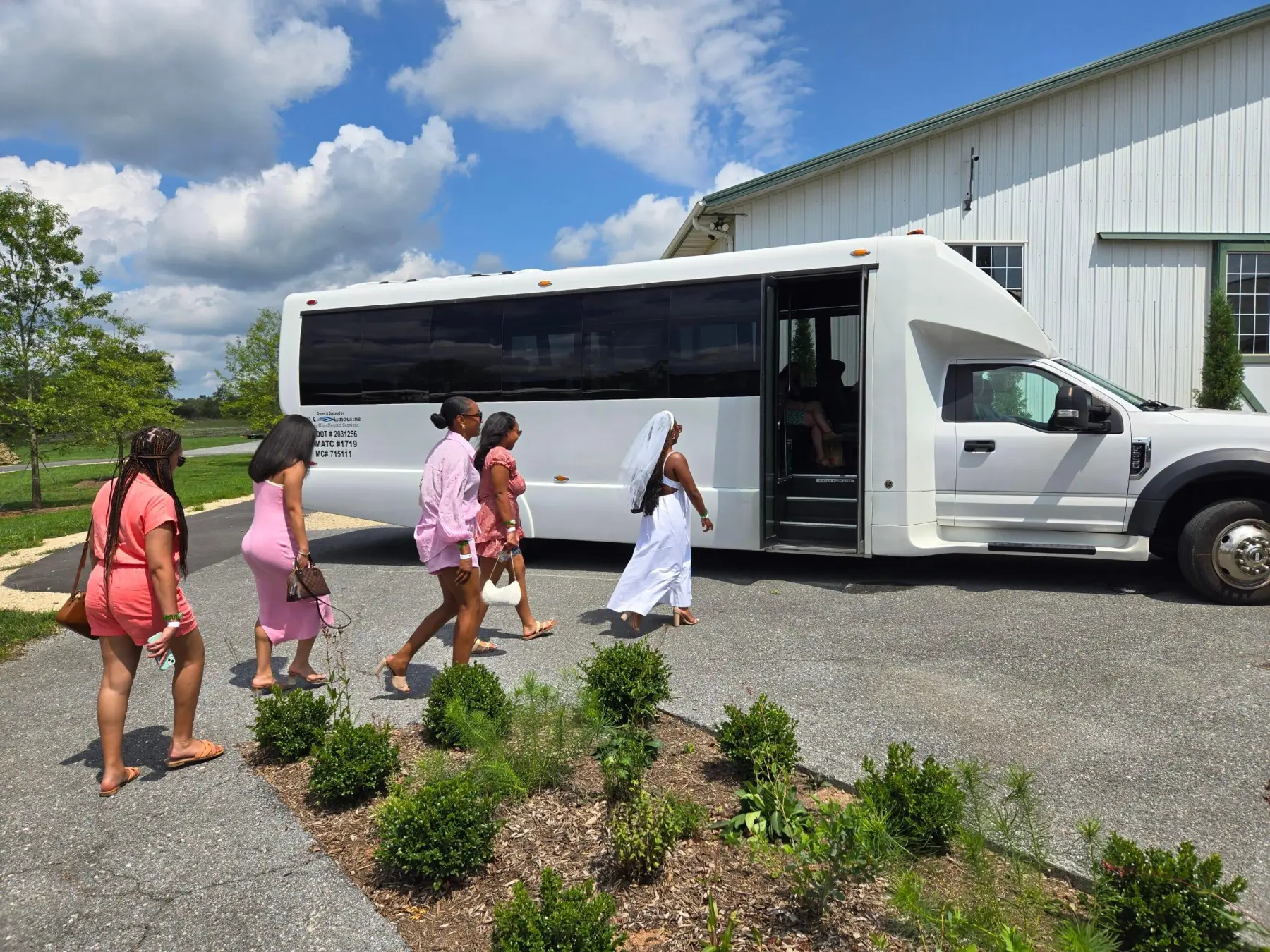 A bridal group celebrating together in Virginia wine country