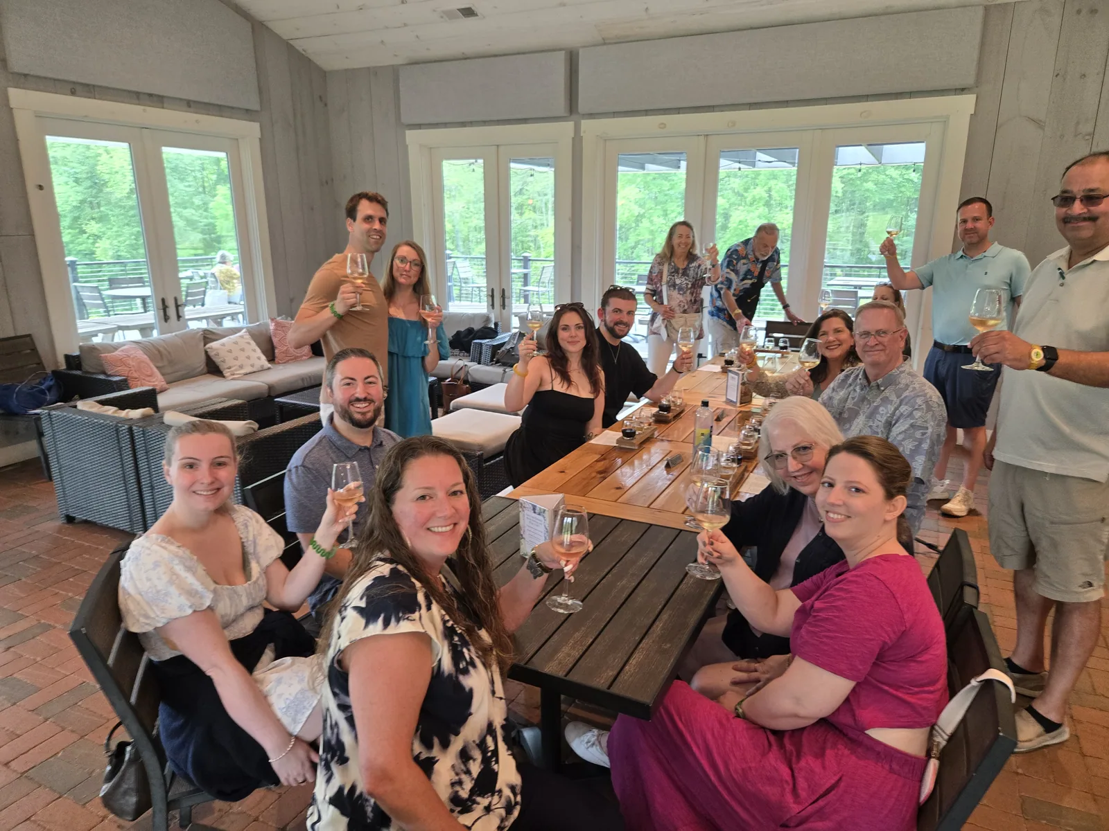 Guests gathered at a busy Loudoun County winery tasting room bar