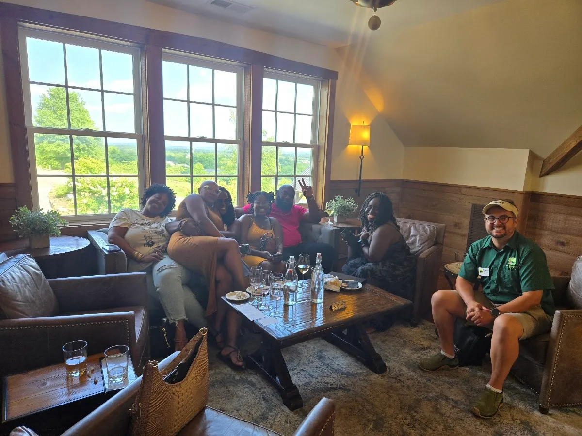 A Vineyard Voyages group relaxing with wine in the lounge at Williams Gap Vineyard in Round Hill