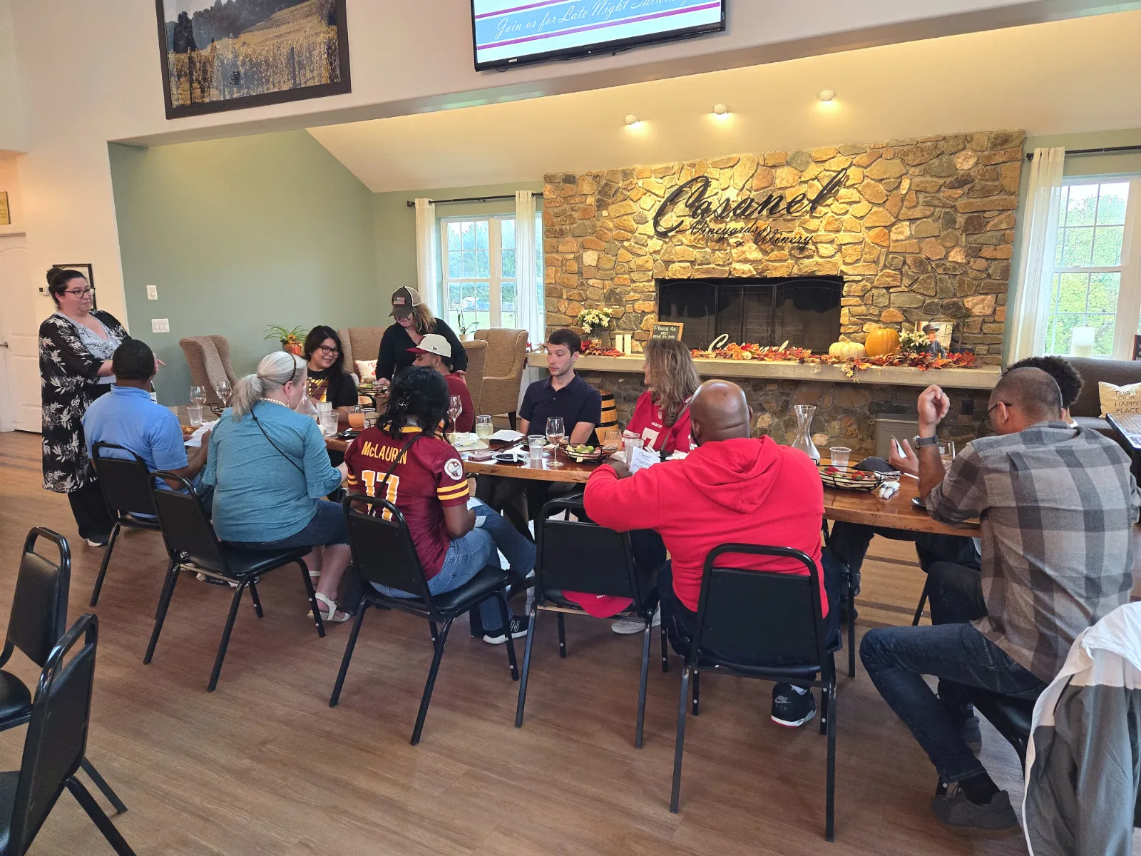 A Vineyard Voyages group seated for a tasting in the Casanel tasting room